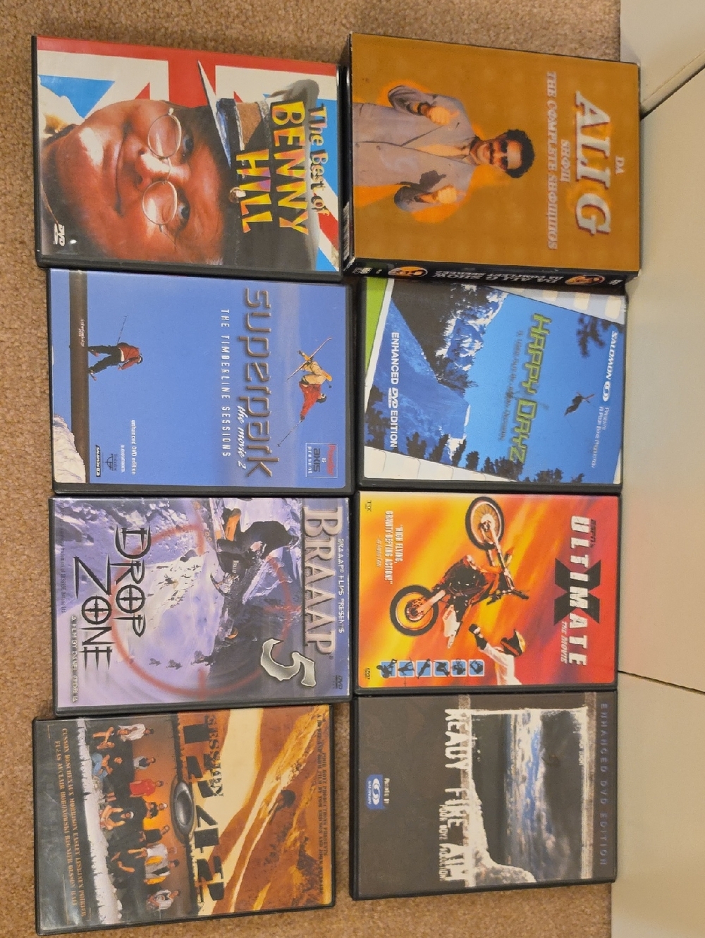 Assorted DVD Collection - Blue, Orange, Black Covers by Various Artists